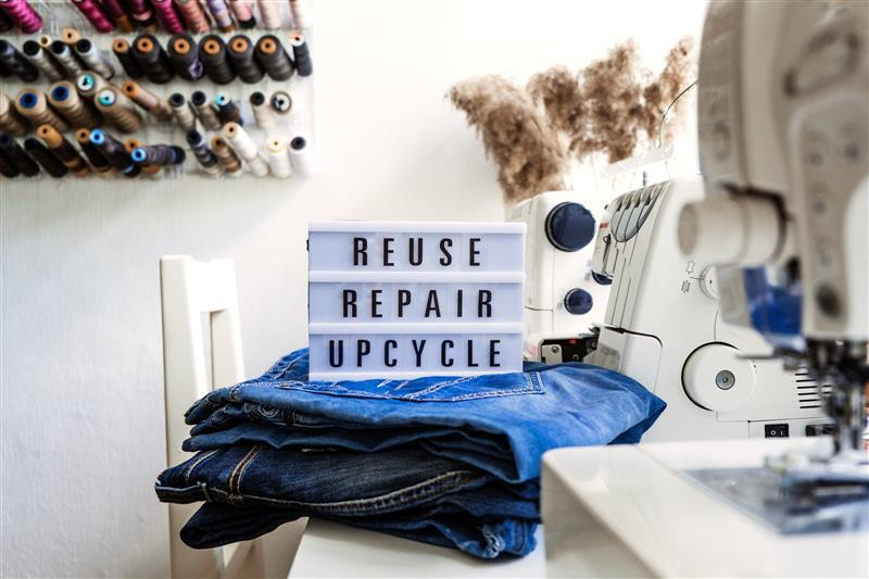 reuse-repair-upcycle-text-on-light-board-on-sewi-2025-03-12-21-34-53-utc_main