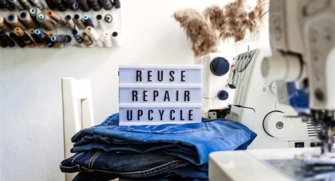 reuse-repair-upcycle-text-on-light-board-on-sewi-2025-03-12-21-34-53-utc_main