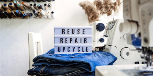 reuse-repair-upcycle-text-on-light-board-on-sewi-2025-03-12-21-34-53-utc_main